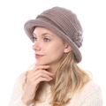 Detail of a thick knitted winter bucket hat for women with a side flower decoration - One Size / Khaki
