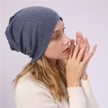 Detail of blue-grey slouchy beanie with sparkling rhinestone stripes on knit fabric - One Size / Light Blue