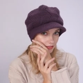 Detail of deep purple knit visor hat with geometric weave and ribbed brim on model - One Size / Deep purple