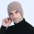 Close-up of oatmeal knit beanie with thick vertical texture and warm fleece lining - One Size / Khaki