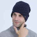 Men's dark blue knitted beanie with plush lining and round patch for winter warmth - Navy Blue