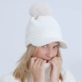 Winter white knit peaked beanie for women with large fluffy faux fur pompom decoration - One Size / White