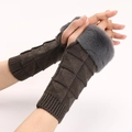 Macro detail of knit fingerless gloves with brown waffle pattern and grey faux fur trim - Dark Gray