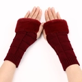 Close-up of knit fingerless gloves in burgundy with fuzzy faux fur trim and triangle pattern - Burgundy