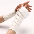 White knitted fingerless gloves with faux fur trim and textured checkered pattern - White