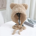Detail of plush camel cat ear hat showing soft faux fur texture and long braided straps - One Size / Camel