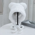 Detail shot of white plush balaclava hat with cute bear ears on a minimal display - One Size / White