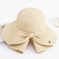 Faltbarer Damen Strohhut mit breiter Krempe, Schleife und M-Logo für den Sonnenschutz - Einheitsgröße / Beige