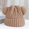 Close-up of thick ribbed knit texture and cute bear ear design on a warm beige beanie - One Size / Khaki