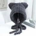 Detail of dark grey plush hat featuring bear ears and long ties for winter warmth - One Size / Dark Gray