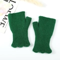 Detailed view of dark green ribbed knit fingerless gloves with scalloped wave edge - Green