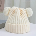 Close-up of thick ribbed knit texture and cute knitted bear ears on a cream winter hat - One Size / Off White