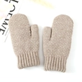 Close-up of oatmeal knit mittens featuring thick ribbed cuffs and soft wool texture - Khaki
