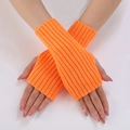 Close-up of bright orange ribbed knit fingerless gloves with thick vertical texture - Orange