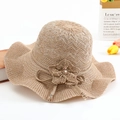 Khaki wavy-brim knitted sun hat with floral pearl accent for beach and summer travel - One Size / Khaki