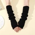Long black knitted arm warmers with thumb holes and ribbed texture in Y2K style - Black