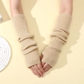 Beige knitted long fingerless arm sleeves with ribbed texture for a slouchy winter look - Beige