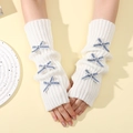 Y2K knit arm warmers in cream white featuring six blue bows and ribbed texture - White Base - Blue Bow