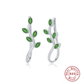 Detailed view of S925 sterling silver branch earrings with green marquise-cut gemstones - Silver-Green Zircon