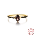 Elegance 925 sterling silver ring with gold finish and oval red garnet gemstone - Gold Oval Dark Red Gemstone Side Diamond Ring