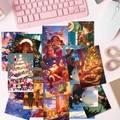 Lot de 50 cartes postales de Noël festives avec Père Noël et décors de paysages d'hiver - Série d'Illustrations de Noël (T01042192)
