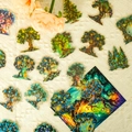 Detail of waterproof green magic forest PET stickers with gold foil and laser finish - T01042141(30)