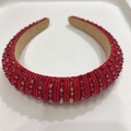 Detailed close-up of a handmade red crystal beaded sponge headband with wide brim - Red Crystal And Beads