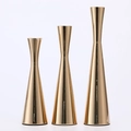 Three-piece gold electroplated metal candlestick set with sleek minimalist conical bases - Set / Gold