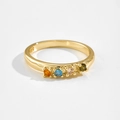 Gold ring with four colorful round zircons and polished finish on white background - US 6 / 18K Gold