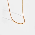 Détail du collier tennis en argent S925 doré avec des zircons rouges ronds - Or 18k [Rouge]