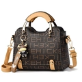 Chic brown patterned crossbody handbag with tan handles and cute bull charm strap - Letter Print Earthy Yellow