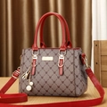 Fashionable large capacity monogram handbag with red leather straps and tassel detail - Khaki & Red