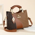 Elegant brown handbag with FIDM logo print and golden hardware in a 45-degree view - Style F / Brown