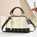 Elegant cream and black handbag with pearl charm and textured lychee pattern finish - 25*13*15 / Black and White