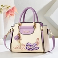 Elegant beige and purple embroidered handbag with floral motifs and Denifor logo - Purple