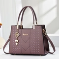 Deep purple textured leather handbag for women with gold hardware and top handles - Quilted Style / Purple