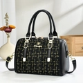 Elegant black and gold tweed Boston handbag with leather straps and gold metal hardware - Black