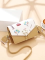 Fashionable graffiti crossbody bag with pearl cat ear buckle and travel illustrations - Yellow