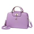 Lavender embossed PU leather handbag with golden deer charm and circular metal handles - Light Purple