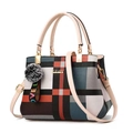 Fashionable plaid handbag with multicolored stitching and a grey pompom charm - White