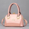 Pink patent leather Boston handbag with gold hardware and crystal clasp detail - One Size / Pink