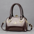 Glossy burgundy patent leather shell handbag with gold handle and metallic logo - One Size / Coffee