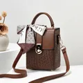 Brown box-shaped mini handbag with woven texture and decorative floral scarf detail - Coffee