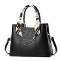 Elegant black embossed floral handbag with a decorative silk scarf and gold hardware - Black