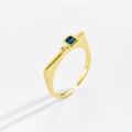Detail shot of a golden adjustable ring with a square blue zircon and mirror finish - Adjustable Open / 18K Gold (Blue)