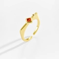 Macro detail of adjustable gold ring with square red stone and black zircon accent - Adjustable Open / 18K Gold (Orange Red)