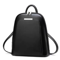 Front detail of black faux leather backpack featuring silver metal trim and zipper pocket - 26x12x31x8cm / Black