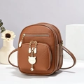 Brown lychee leather mini backpack with golden cat charm and dual zipper pockets - 16*9*20 / Earthy Yellow