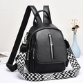 Chic black PU leather backpack for women featuring a geometric patterned wide strap - Black