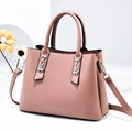 Dusty rose leather handbag for women featuring silver chain accents and top handles - 28*12*21 / Pink